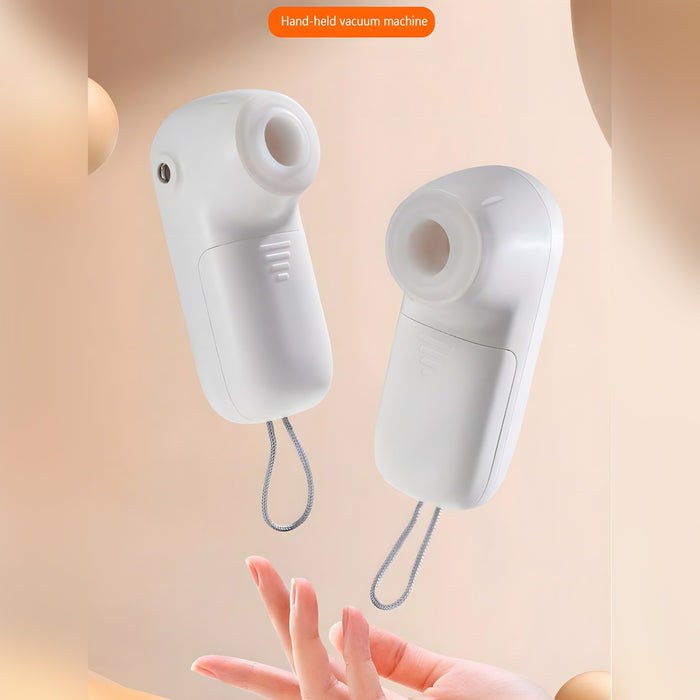 A Person is Holding DLC 6-in-1 Inflator Pump & Handheld Vacuum.
