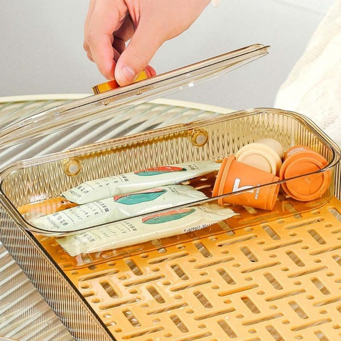 Someone is holding a part of the Double Layer Drain & Dining Tray for the home kitchen