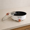 Electric Frying Pan in a kitchen countertop.