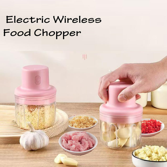 A Person is Operating Electric Garlic Chopper.