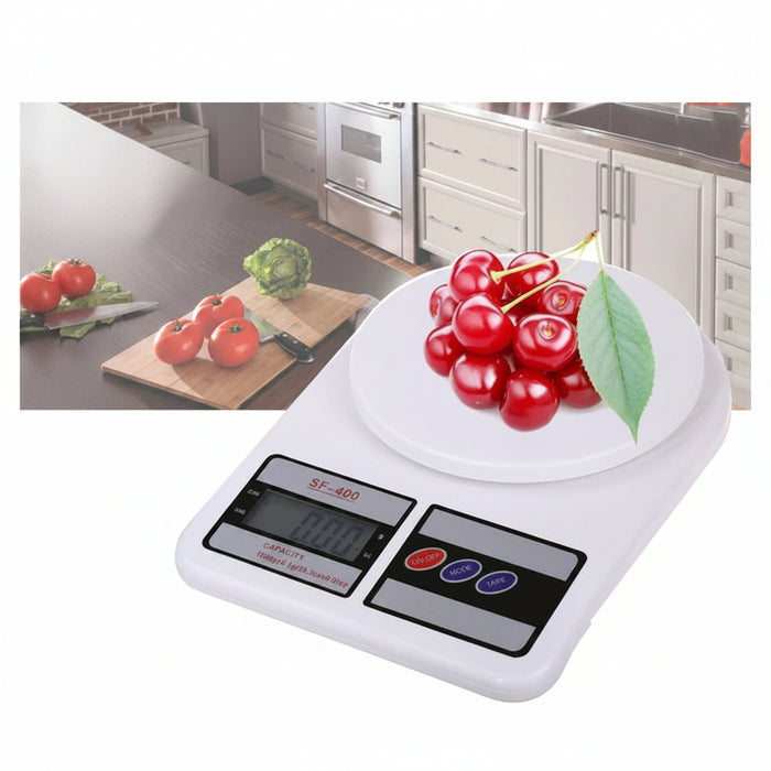 Digital kitchen scale with cherries on a white background