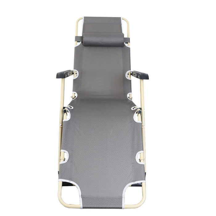 Gray folding beach chair on a white background