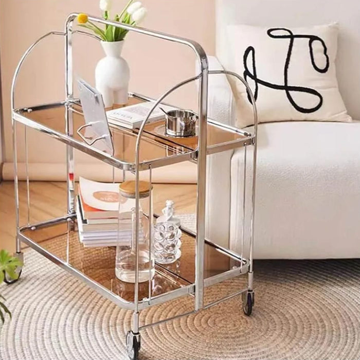 folding 2-tier serving trolley with different things are arranged on it.