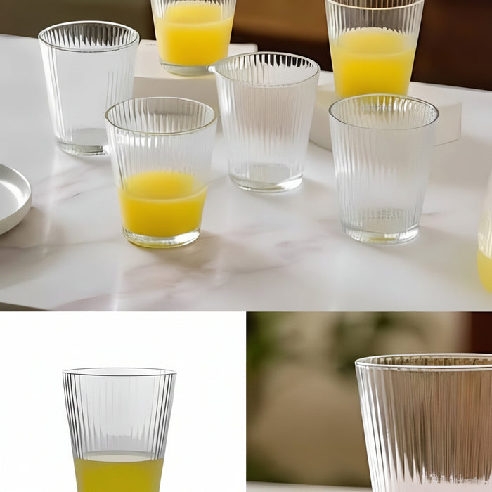 Glass Water Jug & Drinking Glass Set filled with orange juice on a marble surface, with measurements and design details shown.