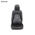 Car seat with a Green Lion Memory Foam Seat Cushion on a white background