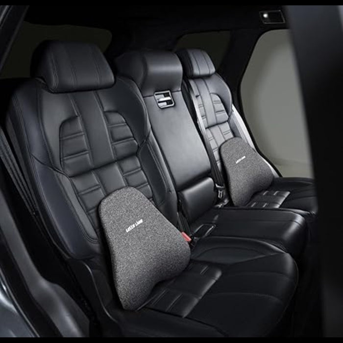 Car interior with black leather seats and Green Lion Memory Foam Seat Cushion.