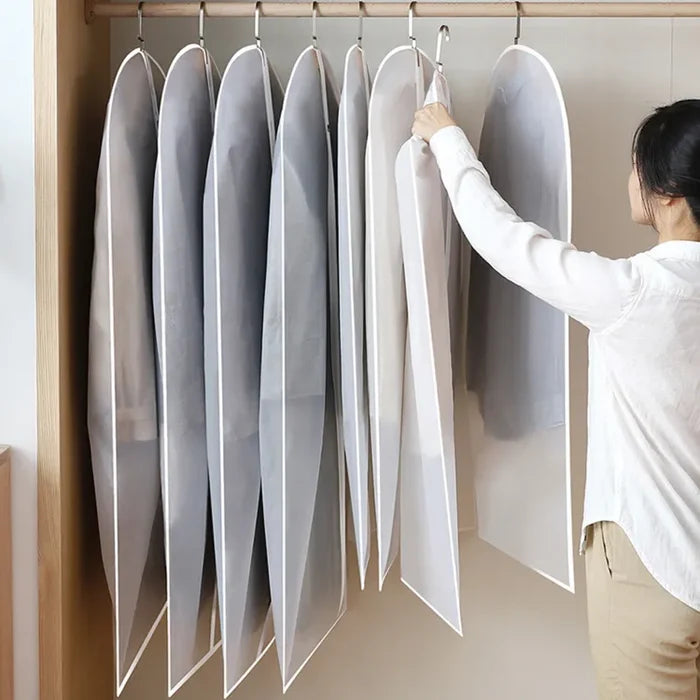 Someone taking a shirt from Hanging Garment Bags