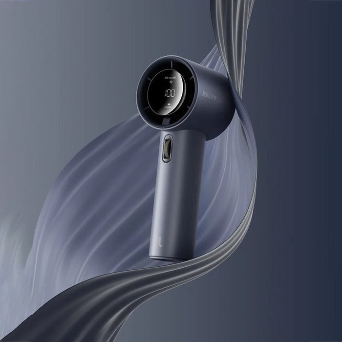 A sleek JisuLife Handheld Fan Pro1 in dark gray and black, shown against a dark blue-gray background with flowing abstract fabric-like swirls.