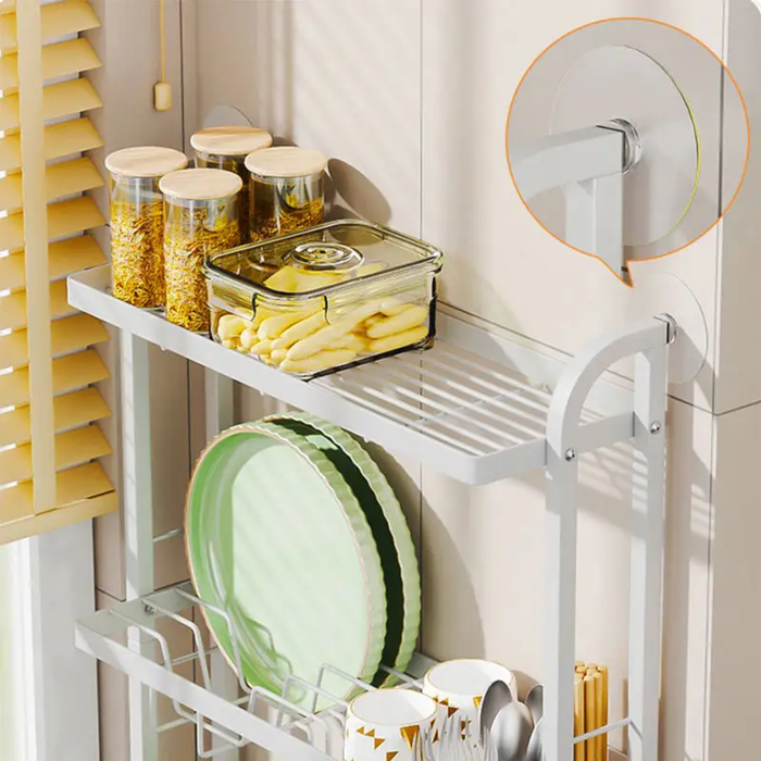 Different Utensils are Arranged in a Kitchen Dish Storage Rack Which is Attached on the Wall.
