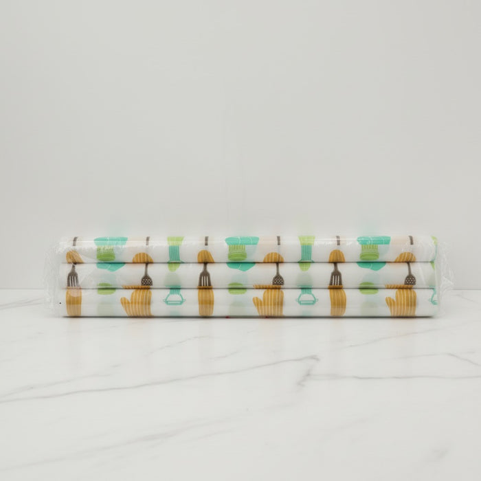 Three folded Kitchen Shelf Liner Mat on a white background