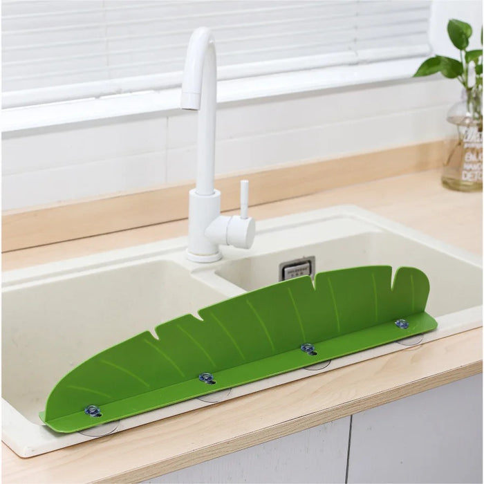 Kitchen Sink Splash Guard installed on a sink showing it's backside