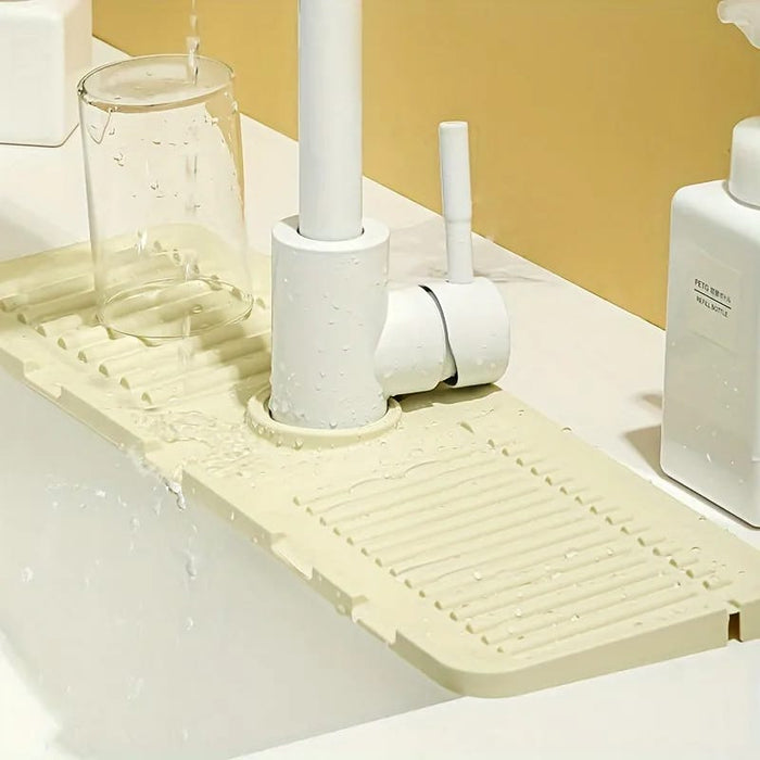 Kitchen Sink Splash Guard Holding Glass.