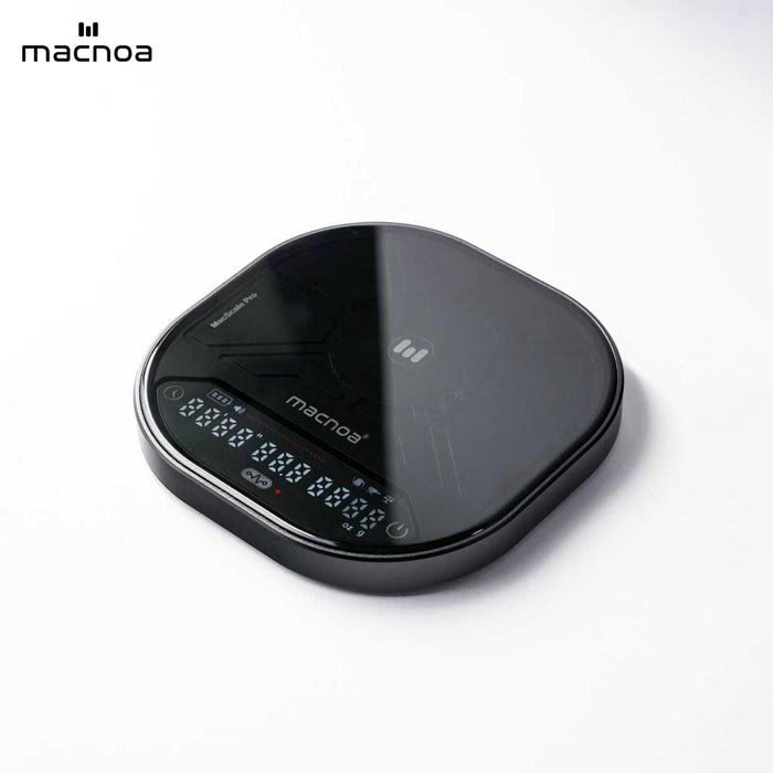 A sleek, Macnoa MacScale Pro Smart Coffee Scale with a glossy finish and an illuminated LCD display, shown on a clean white background with the 'macnoa' brand logo in the top-left corner.
