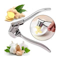 A Person is Crushing Ginger Using Manual Lemon Squeezer & Stainless Steel Ginger Garlic Press