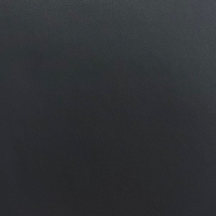 A close-up texture shot of a dark charcoal grey adhesive vinyl, showing a fine grain pattern.
