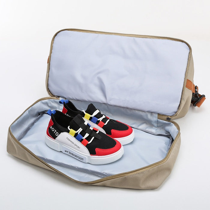 A Pair Of Shoe is Placed on Multi-functional Fashion Fitness Travel Duffle Bag.