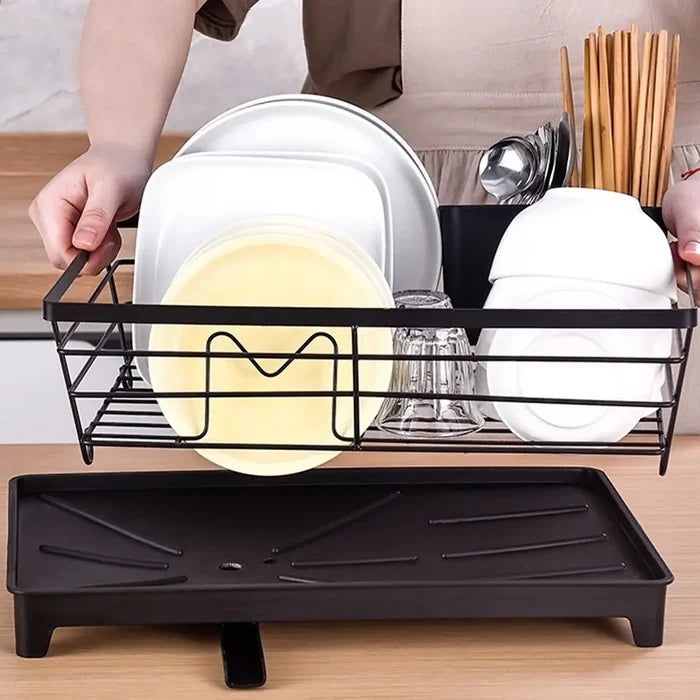 A Person is Arranging Black dish rack.