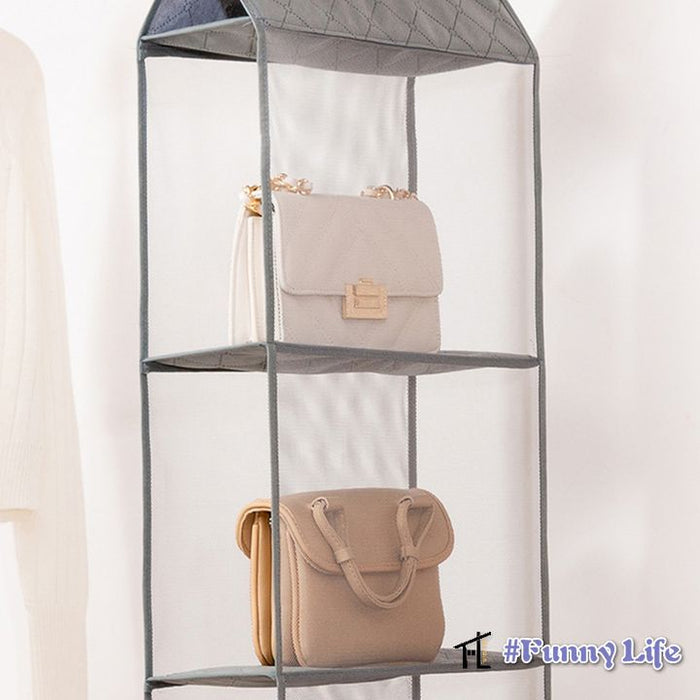 A Multi Layer Hanging Handbag Wardrobe Organizer With Bags On It