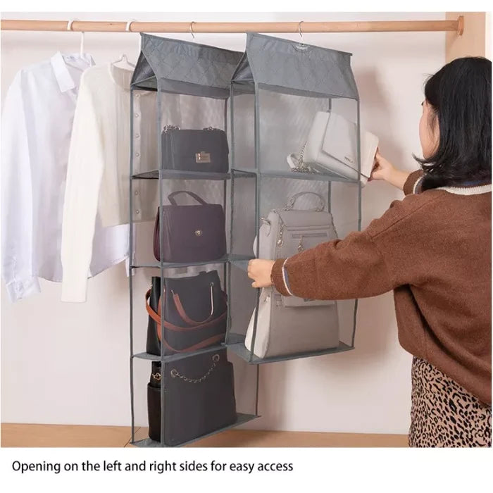 A person putting handbags on a multi layer hanging handbag wardrobe organizer