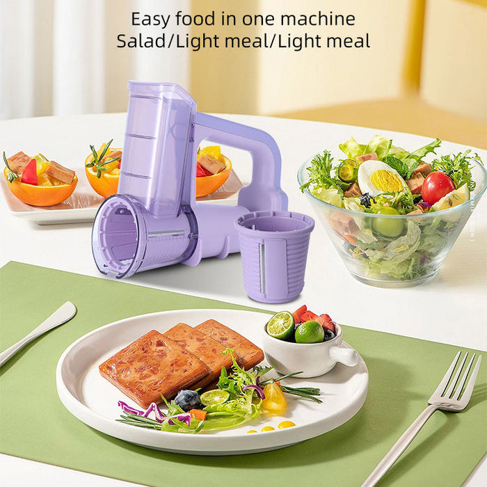 Plates and Bowls of Salad are Placed Around  Electric Vegetable Cutter & Salad Maker in a Table.