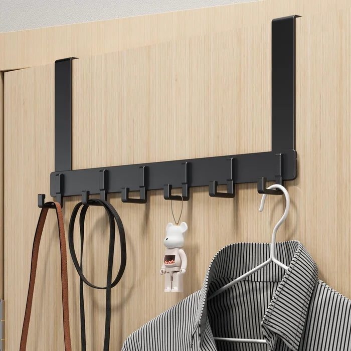 Dresses and Other Accessories are Hanged on a Over Door Hooks.
