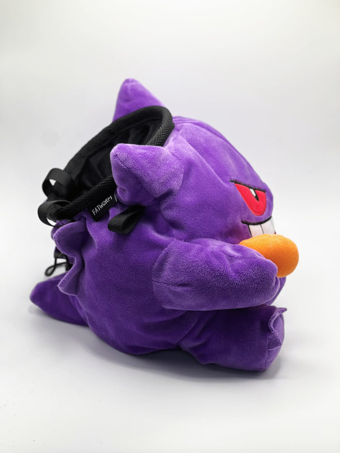 A cute anime plush chalk bag by Fatworm featuring Gengar holding a peanut. This functional and fluffy accessory is handmade for bouldering and climbing for rock climbing, offering a long-durable design that makes the perfect climbing gift for a climber.