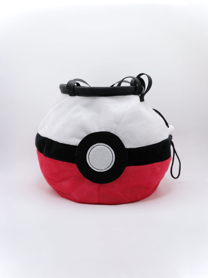 A soft and fluffy Poke Ball plush chalk bag by Fatworm. This cute yet functional climbing gear features the iconic red, white, and black design in a long-durable handmade construction. The perfect climbing gift for climbers who love gaming accessories.