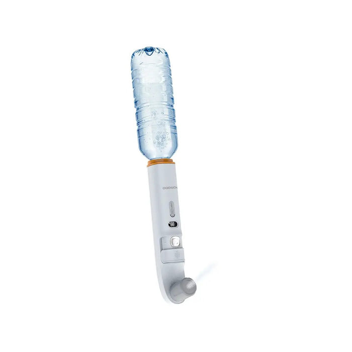 A Porodo Lifestyle 2-in-1 Portable Bidet & Shower is Connected to Water Bottle.