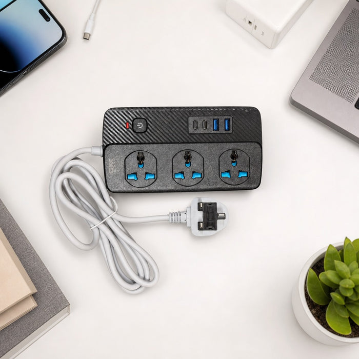 Power Socket Extension is Placed  Along with some electronic Accessories.