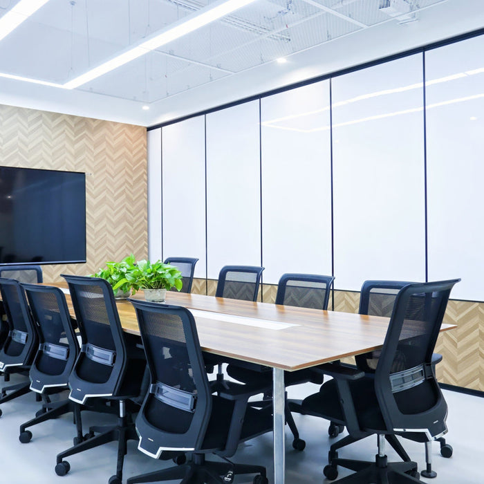Modern conference room with a large Whiteboard film on the wall, table and chairs