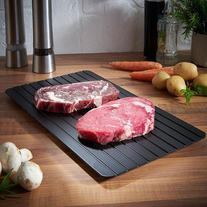 Quick Thaw Meat placed in the kitchen next to some items
