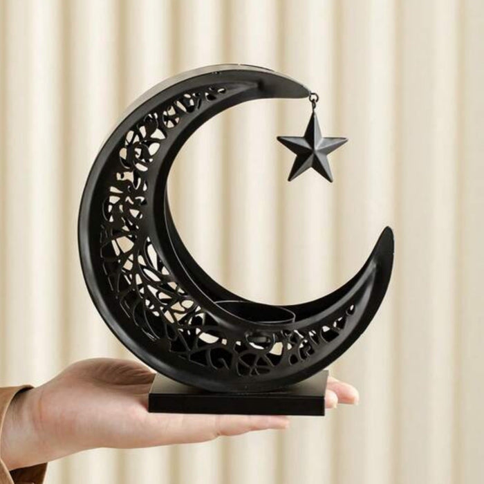 A Person is Holding Ramadan Eid Moon Shaped Bhukoor Burner.