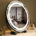 A Round LED Makeup Mirror is Placed on a Makeup Table.