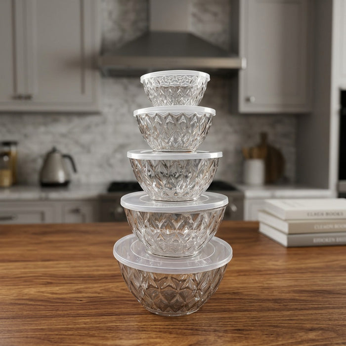 Stack of Salad Bowl Set with lids on a kitchen counter