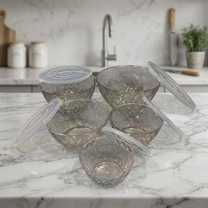 Set of Salad Bowl Set on a marble countertop in a kitchen.