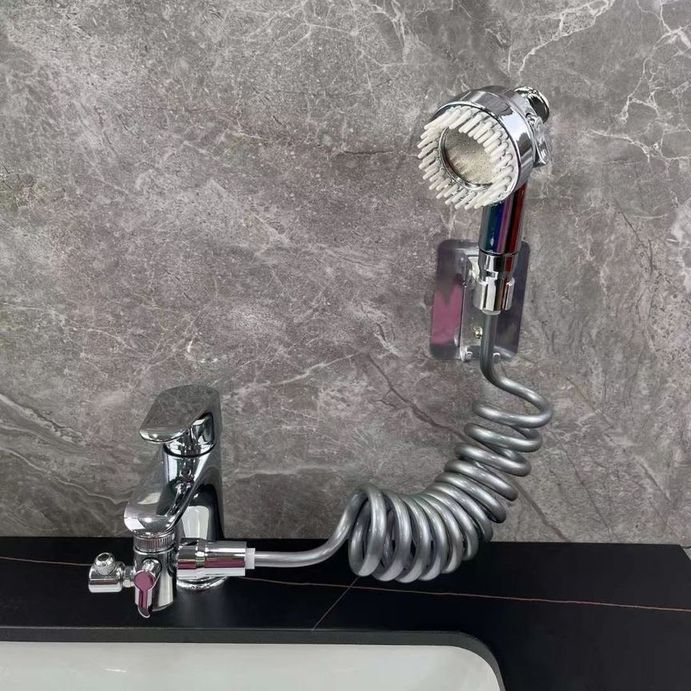 Showcasing a Rotatable Washbasin Faucet Shower which is installed on a wash basin faucet