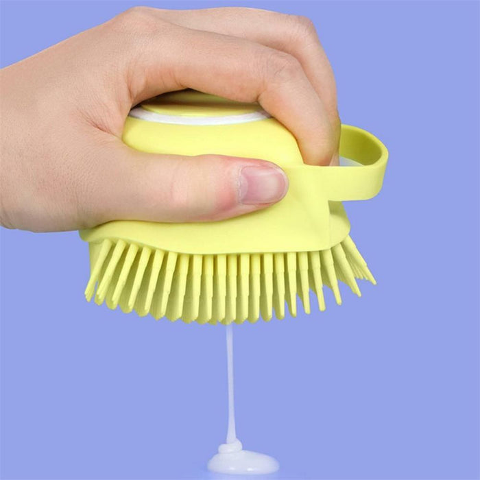 Someone holding a silicone shampoo body bath scrubber comb brush