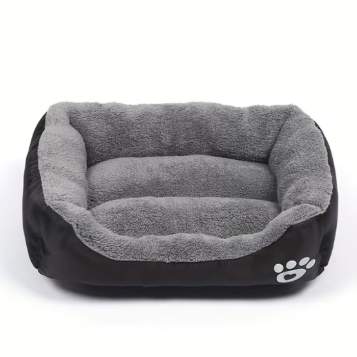 Pet bed with gray interior and black exterior on a white background