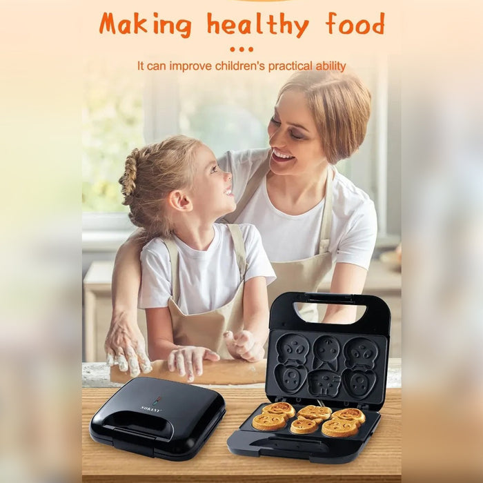 Woman and child making cookies together with a SOKANY Cartoon Cookie Maker  on a wooden surface.