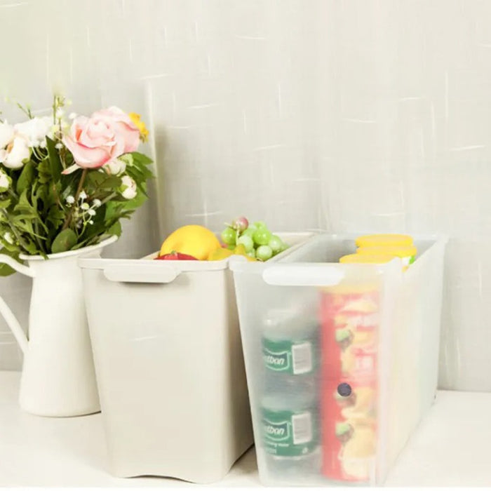 Space-Saving Narrow Gap Long Storage Box with Wheels placed on the floor next to a vase