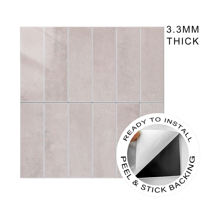 A rectangular peel-and-stick wall tiles in a light pink stone finish, shown with a circular inset demonstrating the peel-and-stick backing and text indicating 3.3mm thickness.