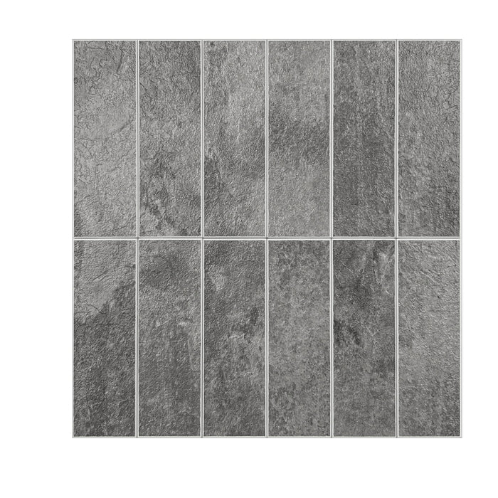 Grey stone-look rectangular wall tiles arranged in a grid pattern, showing a textured surface with light grout lines between the tiles.