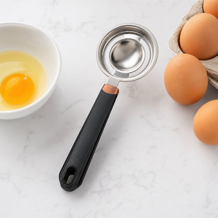 Stainless Steel Egg Yolk Separator and a tray of eggs.