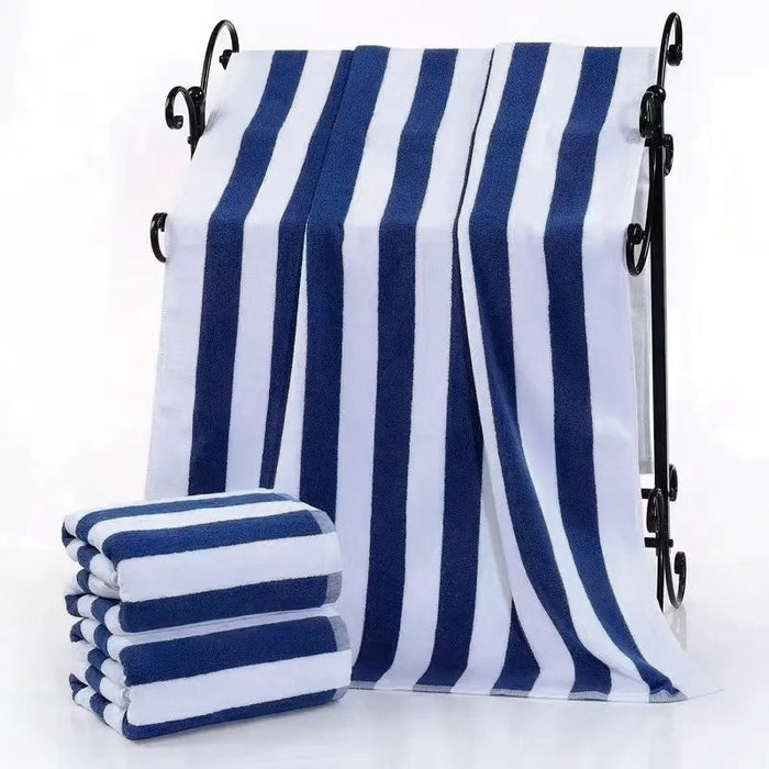 Blue and white striped beach towel on a white background