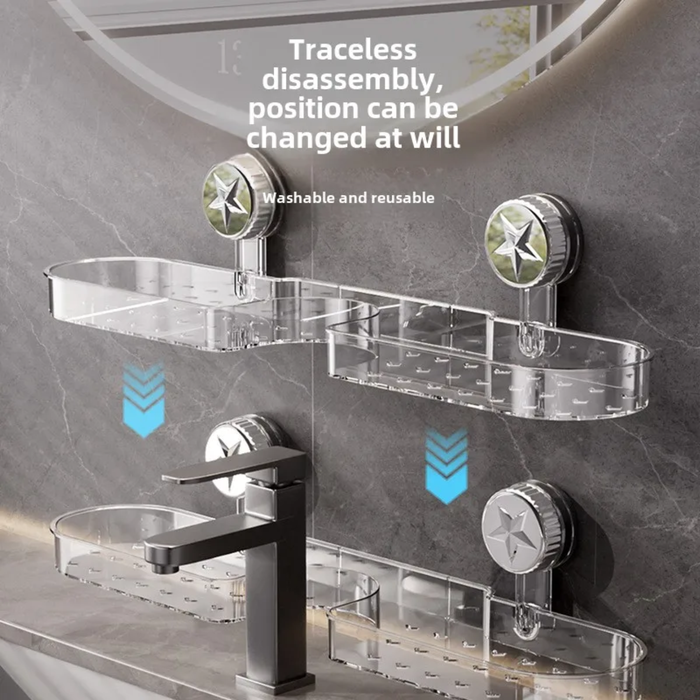 Clear suction bathroom shelf mounted on a tiled bathroom wall above a sink,beside a modern black faucet.
