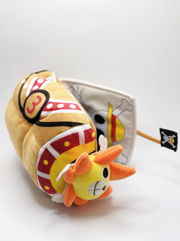 A cute anime plush chalk bag shaped like a famous cartoon pirate ship by Fatworm. This functional lion-headed boat accessory is handmade for bouldering and climbing for rock climbing, featuring a long-durable design that makes a unique climbing gift for any climber.