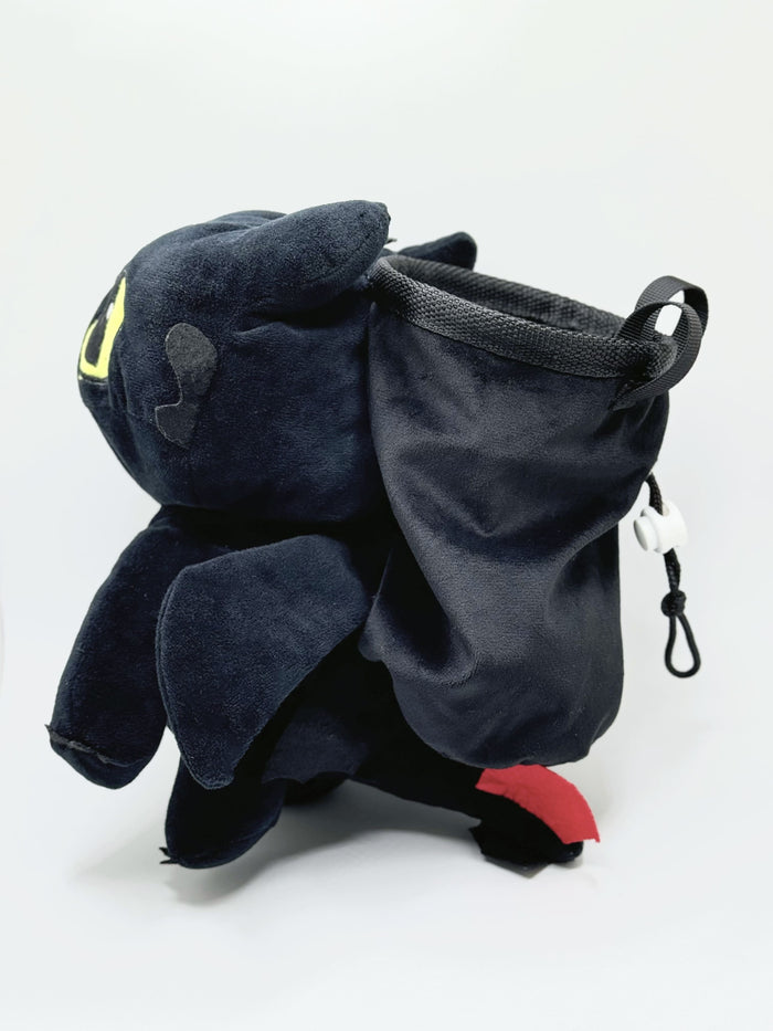 A soft and fluffy Night Fury Toothless "Classic Face" plush chalk bag by Fatworm. Featuring large expressive eyes and a long-durable handmade design, this cute and functional gear is the perfect climbing gift for climbers.