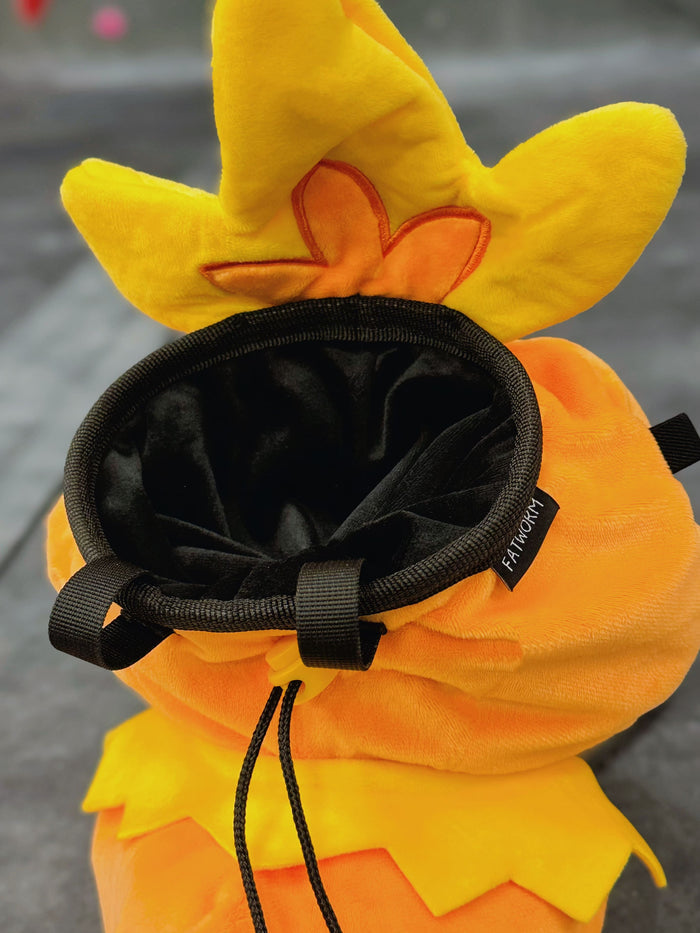 Handmade orange plush Torchic fire chick climbing chalk bag for bouldering. Features yellow feather tufts and a cute bird silhouette. High-quality plush bouldering gift with a 12cm reinforced rim, secure drawstring, and deep black fleece lining for rock climbing.
