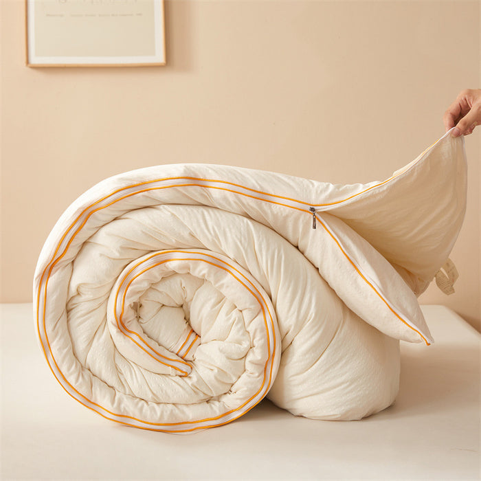 A Person is Holding Ultra Soft Soy Fiber Comforter.