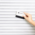 Venetian blind widow film applied with a squeegee